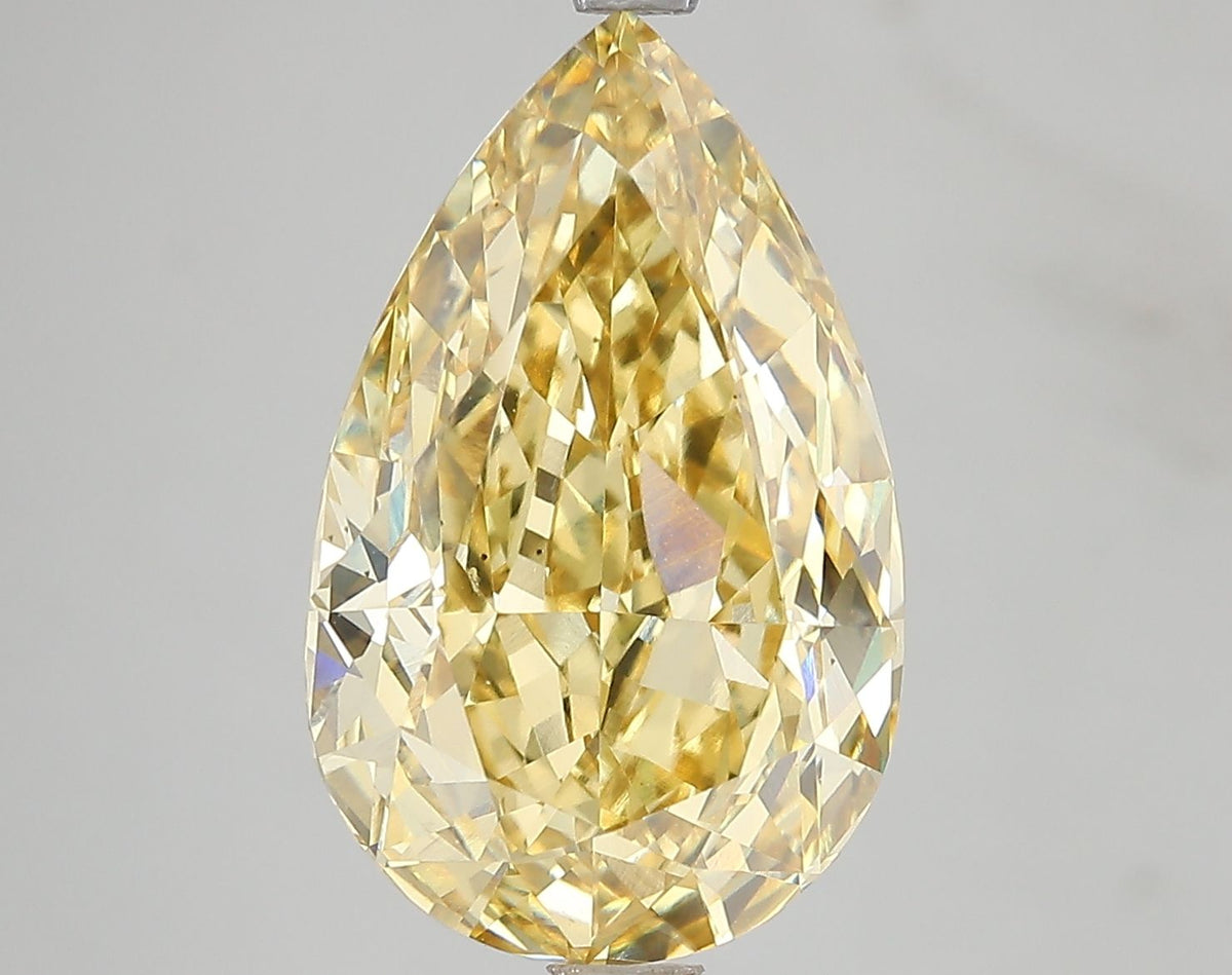 Lab-Grown Pear Diamond - 7.16 Carats, Fancy Vivid Yellow Color, VS2 Clarity - Certified by IGI - Report Number: LG671478725