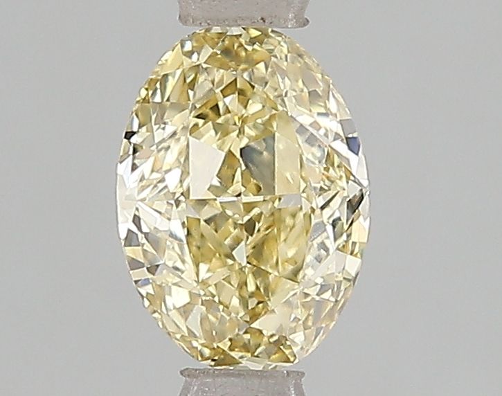 Lab-Grown Oval Diamond - 1.01 Carats, Fancy Yellow Color, VS2 Clarity - Certified by IGI - Report Number: LG671493336