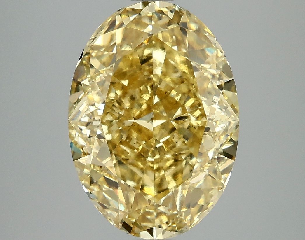 Lab-Grown Oval Diamond - 4.9 Carats, Fancy Vivid Yellow Color, VS2 Clarity - Certified by IGI - Report Number: LG660418679