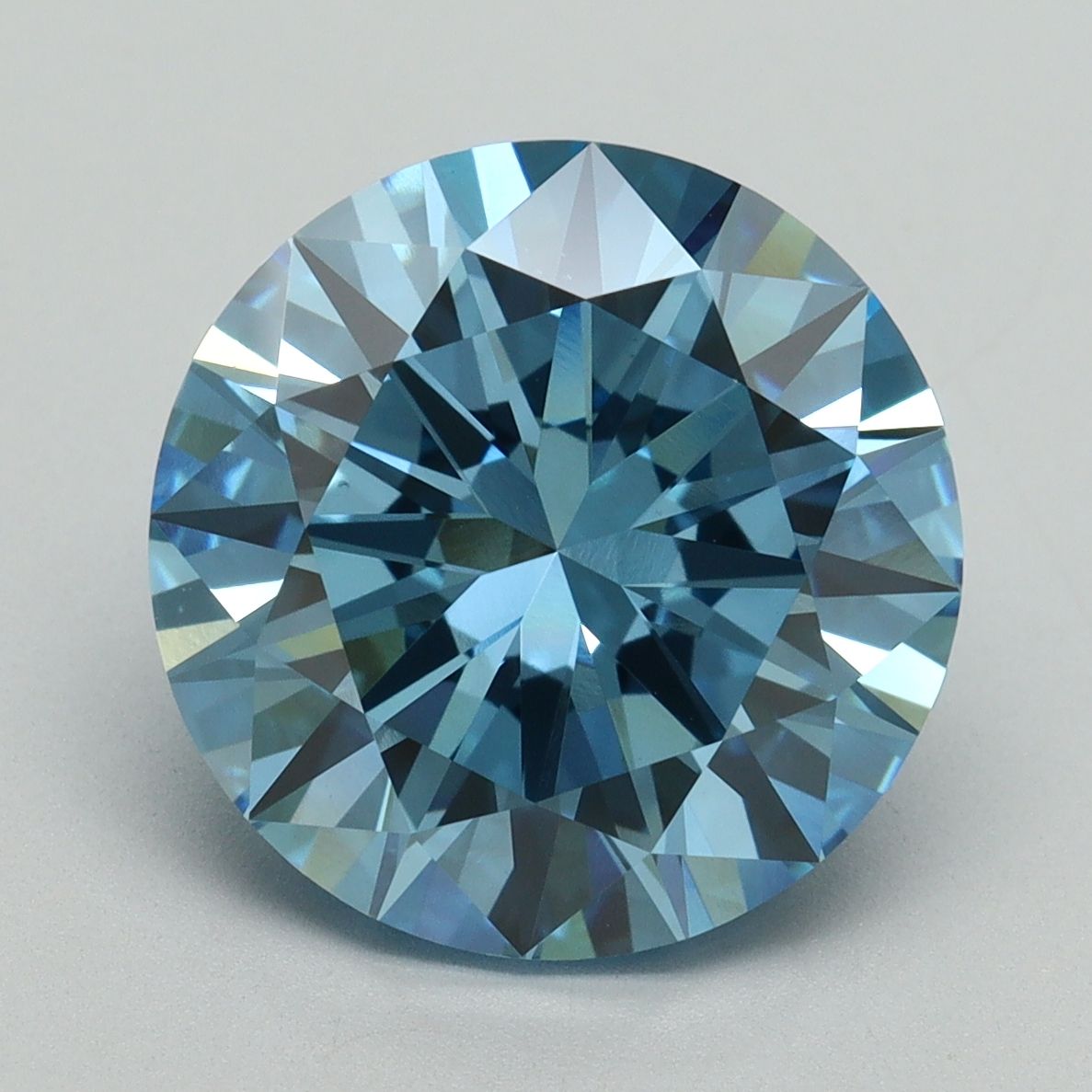 Lab-Grown Round Diamond - 6.08 Carats, Fancy Vivid Blue Color, VS1 Clarity - Certified by IGI - Report Number: LG644432011