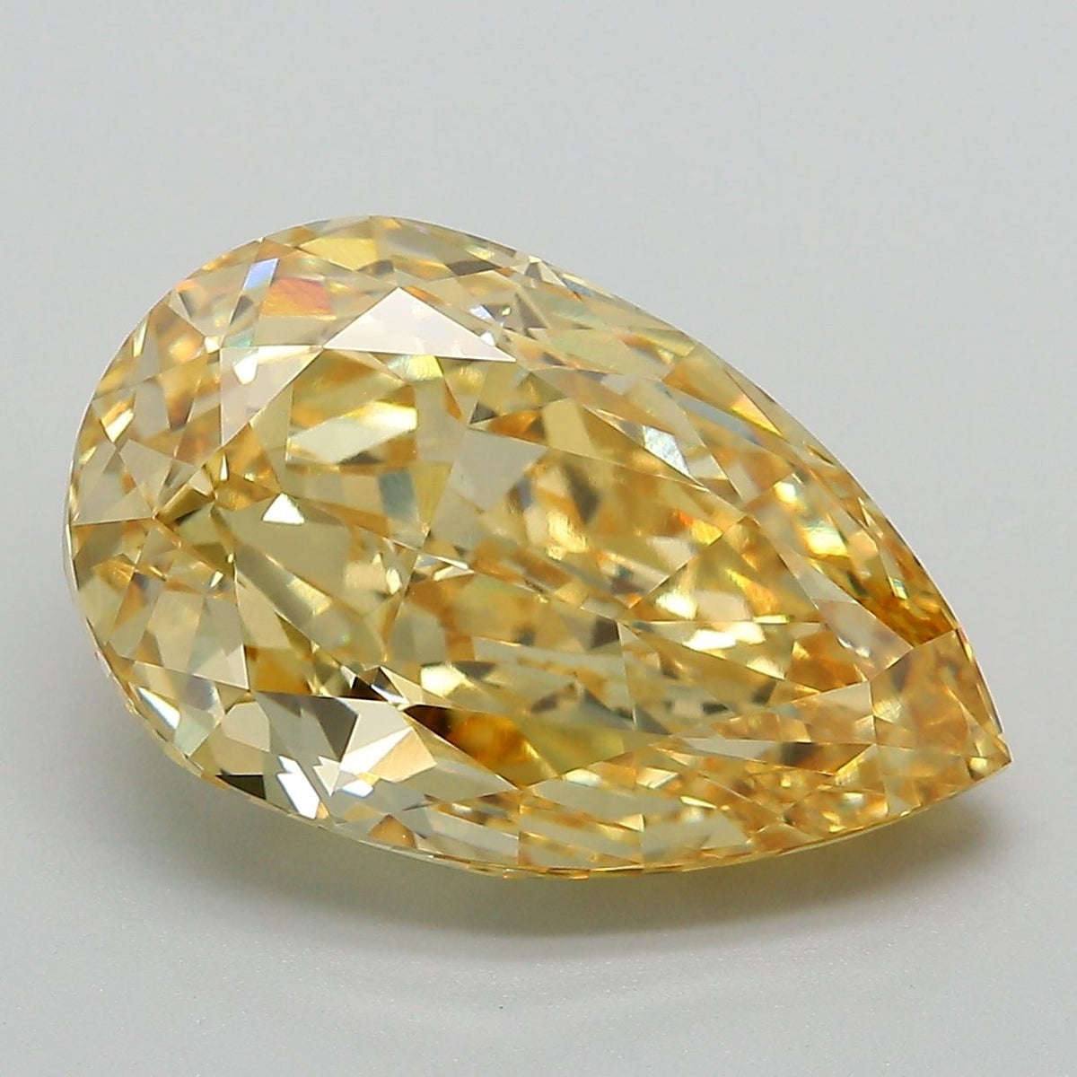 Lab-Grown Pear Diamond - 7.03 Carats, Fancy Vivid Yellow Color, VVS2 Clarity - Certified by IGI - Report Number: LG660453365
