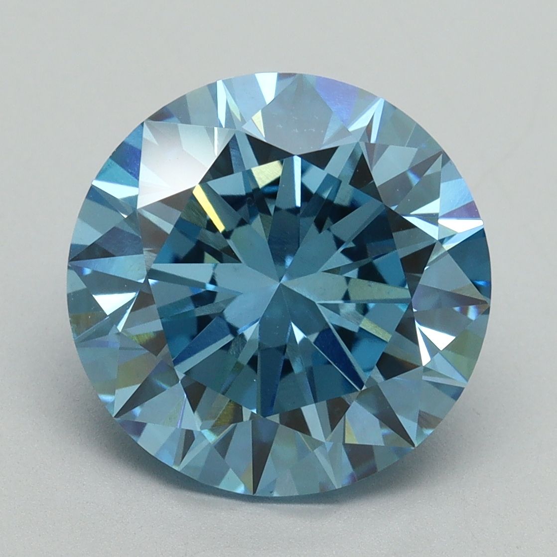 Lab-Grown Round Diamond - 5.52 Carats, Fancy Vivid Blue Color, VS1 Clarity - Certified by IGI - Report Number: LG644432008