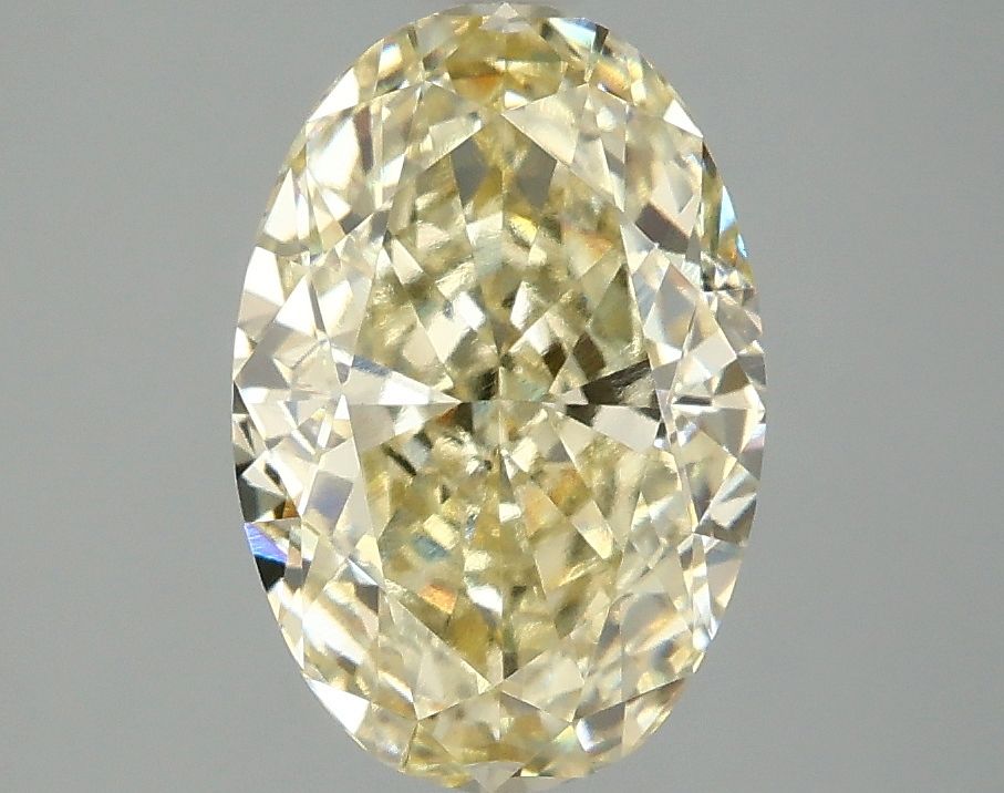 Lab-Grown Oval Diamond - 3.02 Carats, Fancy Yellow Color, VVS2 Clarity - Certified by IGI - Report Number: LG680520040