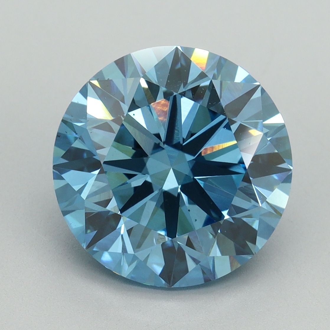 Lab-Grown Round Diamond - 5.02 Carats, Fancy Vivid Blue Color, VS2 Clarity - Certified by IGI - Report Number: LG644430769