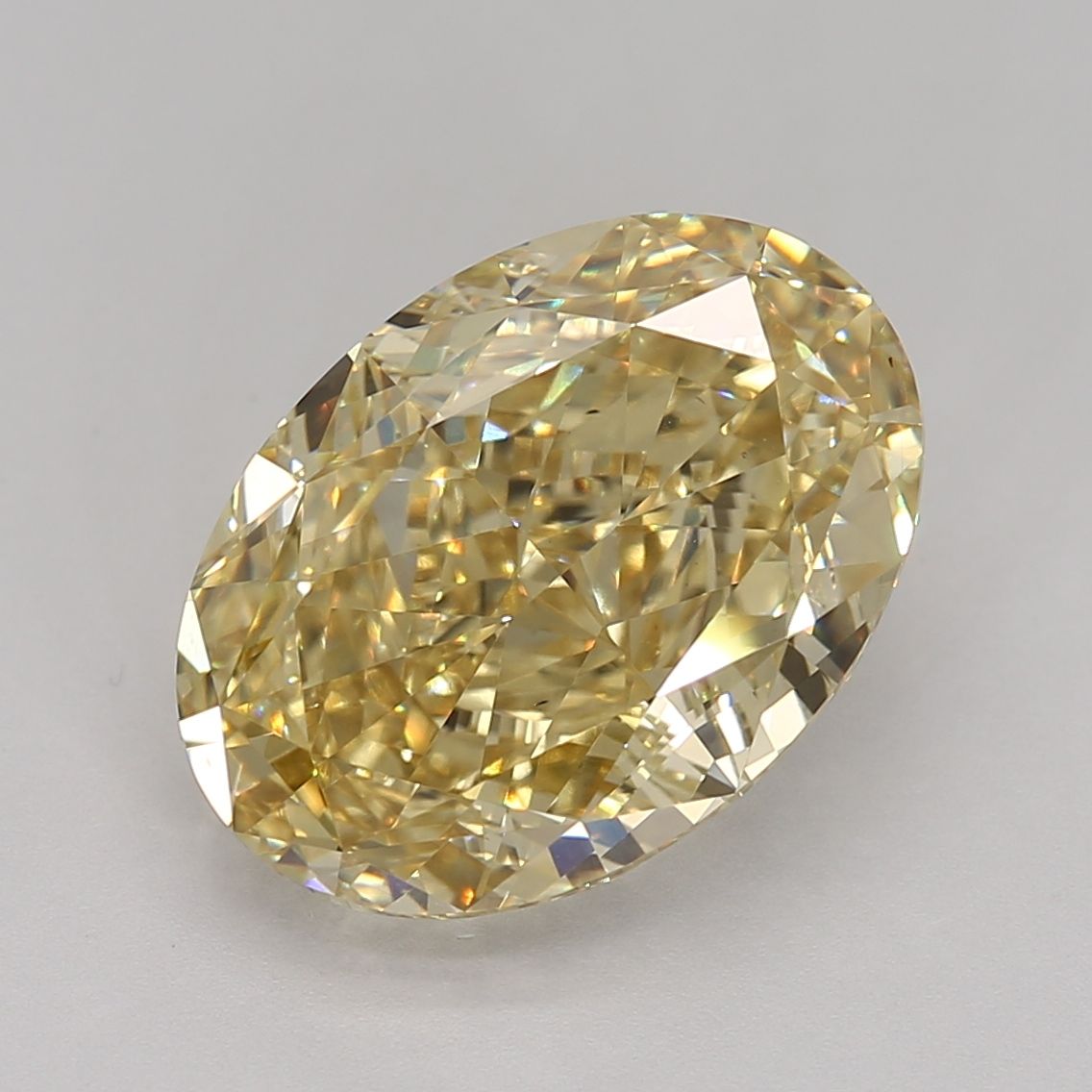 Lab-Grown Oval Diamond - 7.55 Carats, Fancy Intense Yellow Color, VS1 Clarity - Certified by IGI - Report Number: LG665411304