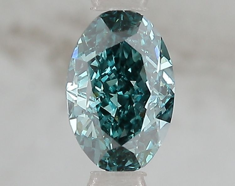 Lab-Grown Oval Diamond - 1.1 Carats, Fancy Vivid Blue Green Color, VS1 Clarity - Certified by IGI - Report Number: LG671493213