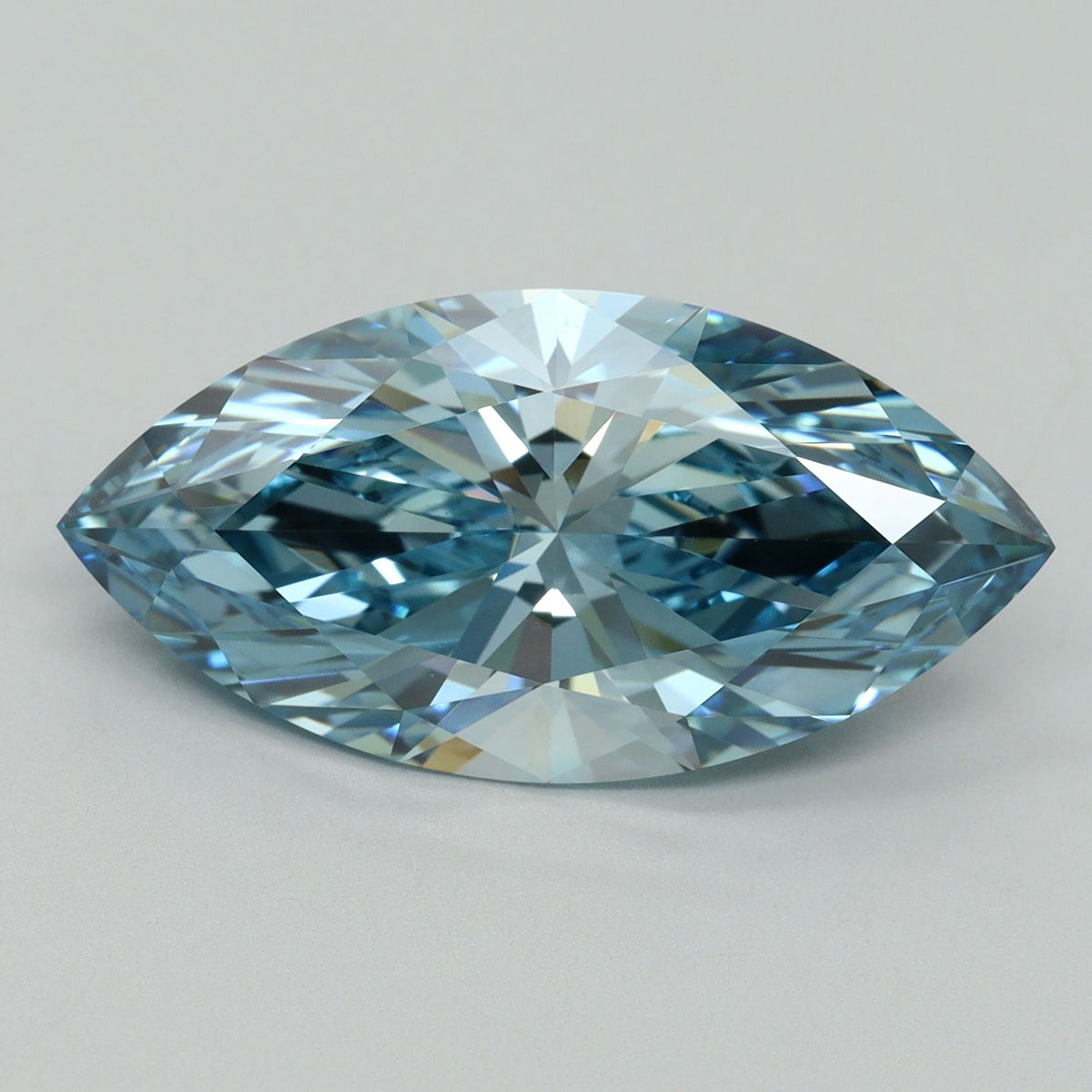 Lab-Grown Marquise Diamond - 7.05 Carats, Fancy Vivid Blue Color, VVS2 Clarity - Certified by IGI - Report Number: LG636438474
