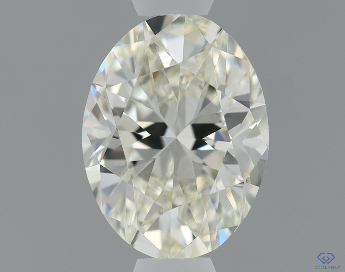 Natural Mined OVAL Diamond - 0.6 Carats, J Color, VVS1 Clarity - Timeless Beauty and Exceptional Brilliance - IGI Certified