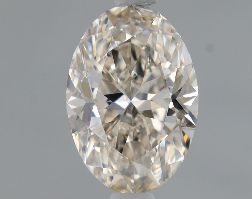 Natural Mined Oval Diamond - 0.61 Carats, J Color, VS1 Clarity - Timeless Beauty and Exceptional Brilliance - Non-Certified