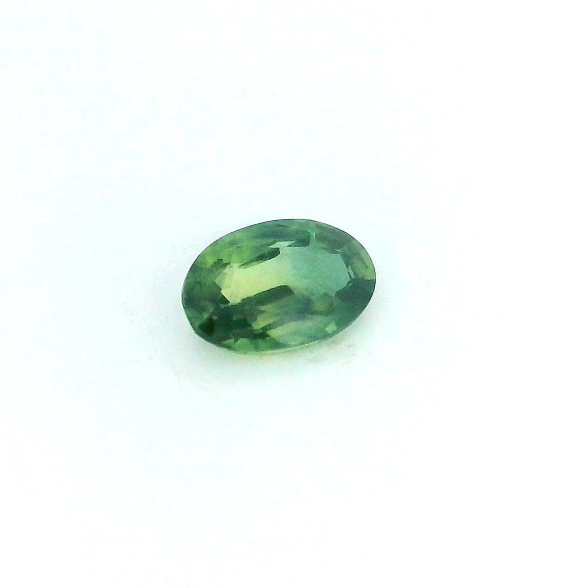 0.35ct Oval Natural Sapphire (Colour Green, Clarity Slightly Included, Cut Faceted)