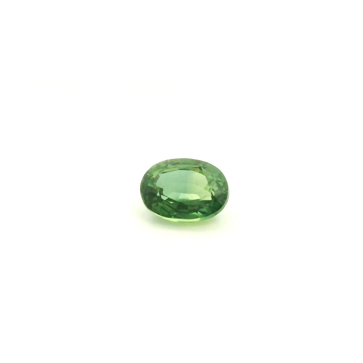 0.87ct Oval Natural Sapphire (Colour Green, Clarity Moderately Included, Cut Faceted)