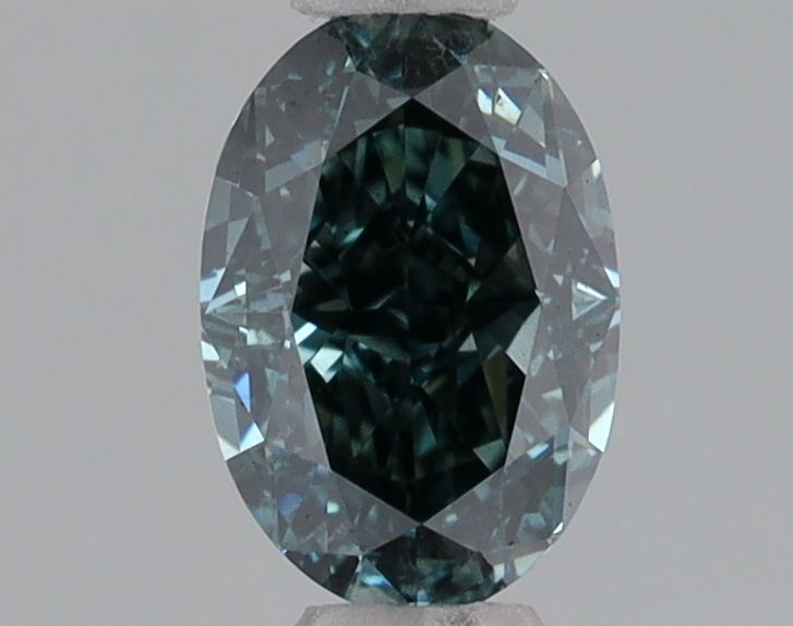 Lab-Grown Oval Diamond - 0.54 Carats, Fancy Deep Blue Green Color, VS1 Clarity - Certified by IGI - Report Number: LG620409866