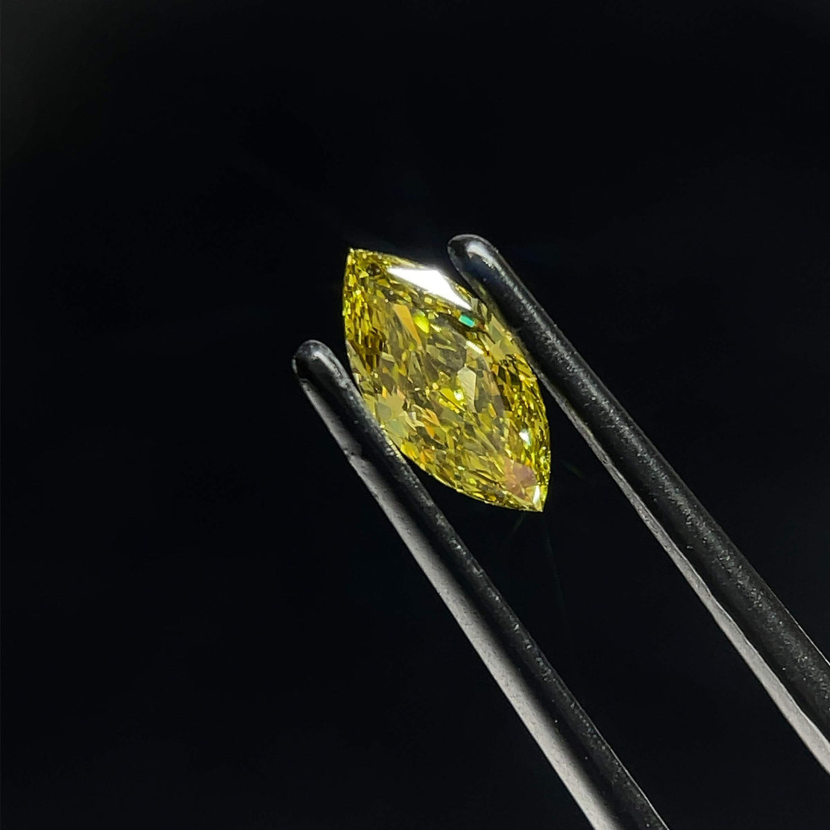 Lab-Grown Marquise Diamond - 0.65 Carats, Fancy Gray Yellow Color, VVS2 Clarity - Certified by IGI - Report Number: LG595381038
