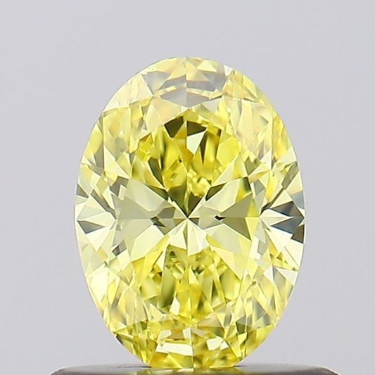 Lab-Grown Oval Diamond - 0.52 Carats, Fancy Vivid Yellow Color, VVS1 Clarity - Certified by IGI - Report Number: LG617425973