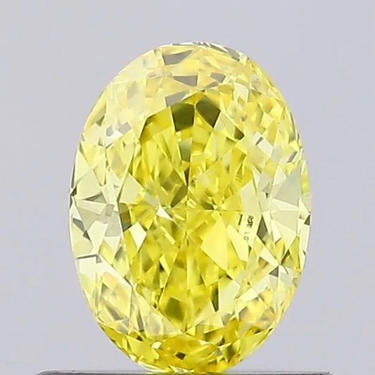0.56ct Oval Lab Grown Diamond (Colour Fancy Vivid Yellow, Clarity VVS2, IGI Certified)