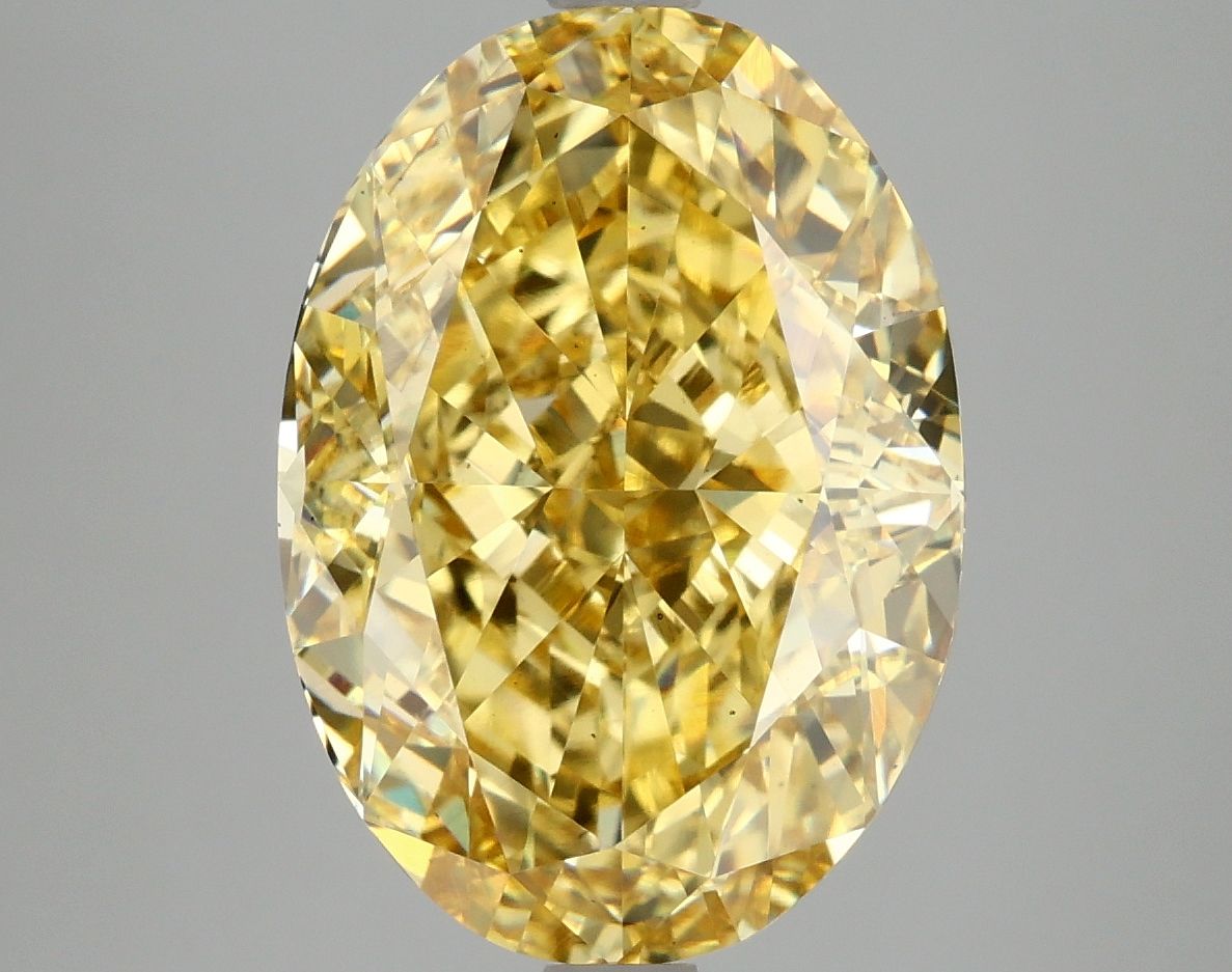 Lab-Grown Oval Diamond - 7.08 Carats, Fancy Vivid Yellow Color, VS2 Clarity - Certified by IGI - Report Number: LG675526657
