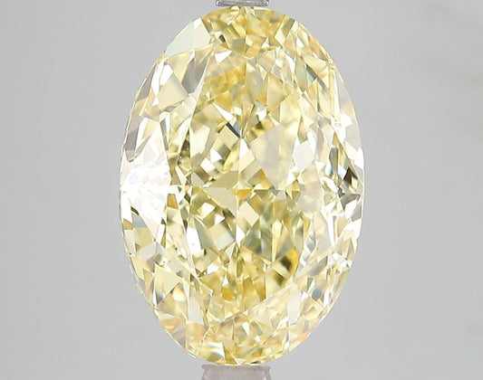 Lab-Grown Oval Diamond - 6.02 Carats, Fancy Vivid Yellow Color, VS2 Clarity - Certified by IGI - Report Number: LG671478728