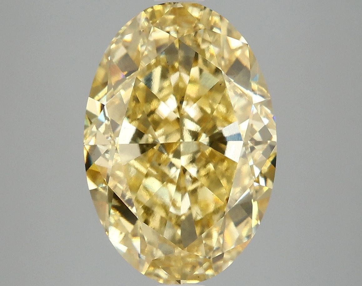 Lab-Grown Oval Diamond - 6.02 Carats, Fancy Vivid Yellow Color, VS2 Clarity - Certified by IGI - Report Number: LG675578577