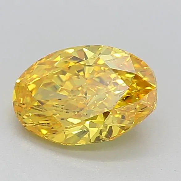 Diamant ovale de 0,70 ct (couleur jaune vif fantaisie, pureté VVS2, certifié IGI)