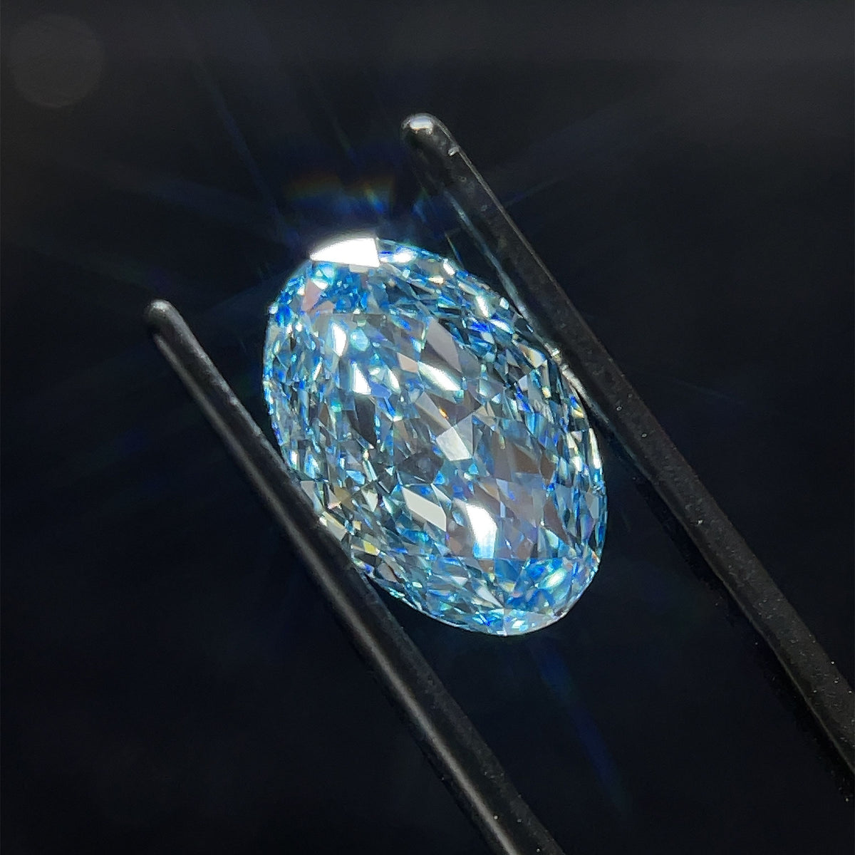 Lab-Grown Oval Diamond - 4.57 Carats, Fancy Vivid Blue Color, VS1 Clarity - Certified by IGI - Report Number: LG638446832