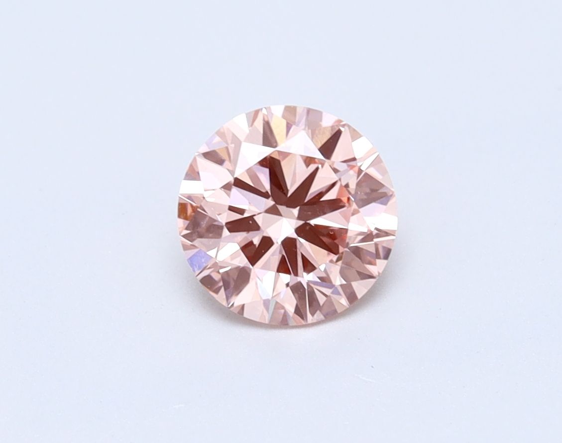 Lab-Grown Round Diamond - 0.71 Carats, Fancy Intense Pink Color, VS1 Clarity - Certified by IGI - Report Number: LG563235309