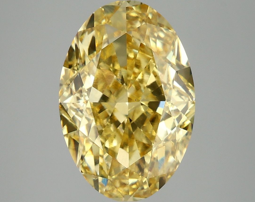 Lab-Grown Oval Diamond - 4.86 Carats, Fancy Vivid Yellow Color, VS1 Clarity - Certified by IGI - Report Number: LG674532177