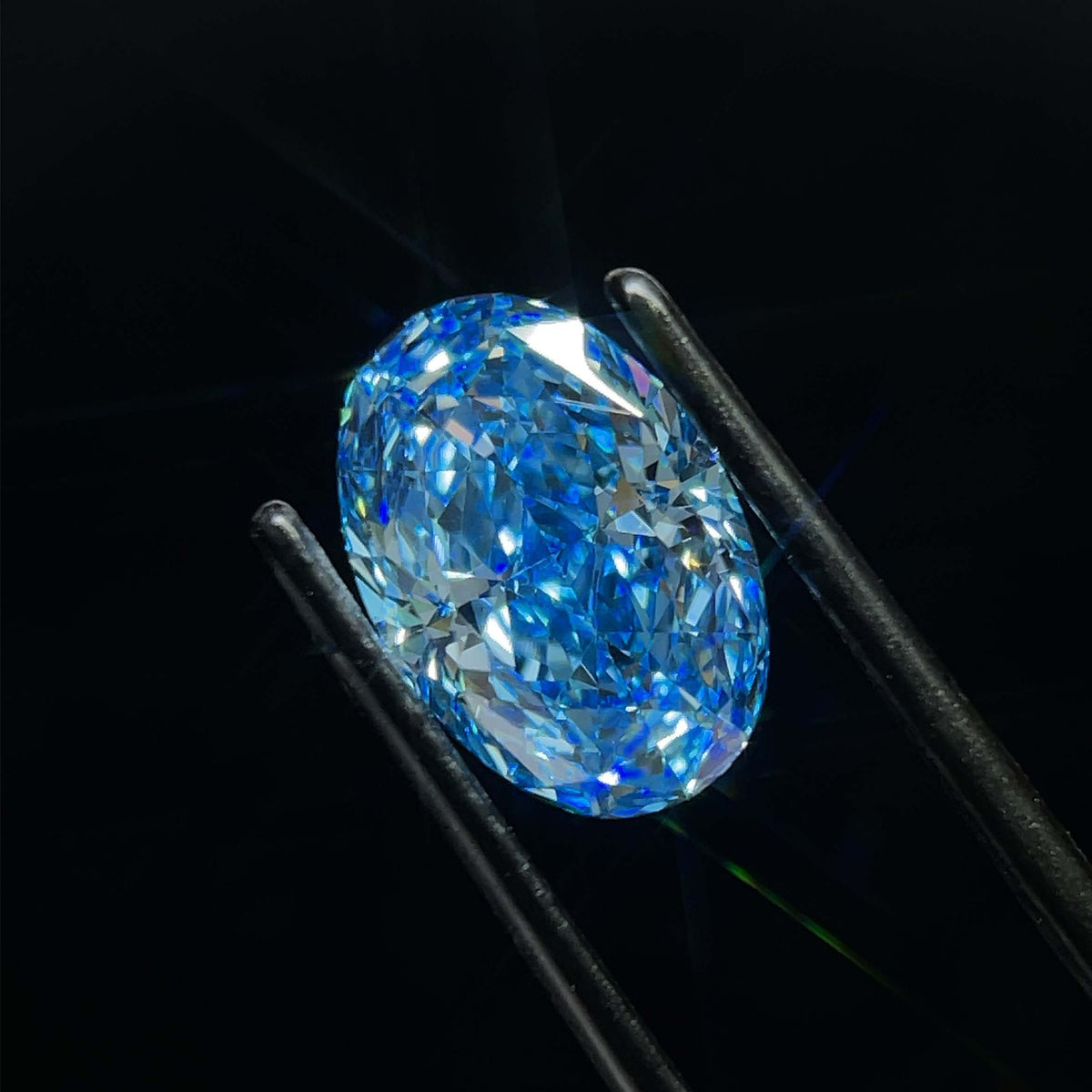 Lab-Grown Oval Diamond - 3.59 Carats, Fancy Vivid Blue Color, VS1 Clarity - Certified by IGI - Report Number: LG623460904