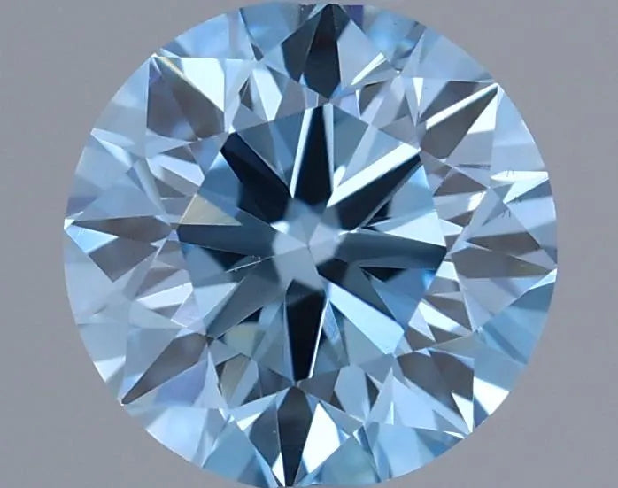 Diamant rond de 0,56 ct (couleur bleu vif fantaisie, pureté VS1, taille EX, certifié IGI)