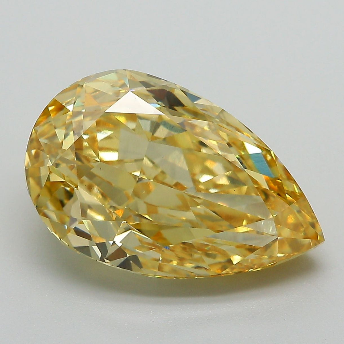 Lab-Grown Pear Diamond - 7.18 Carats, Fancy Vivid Yellow Color, VS1 Clarity - Certified by IGI - Report Number: LG671478726