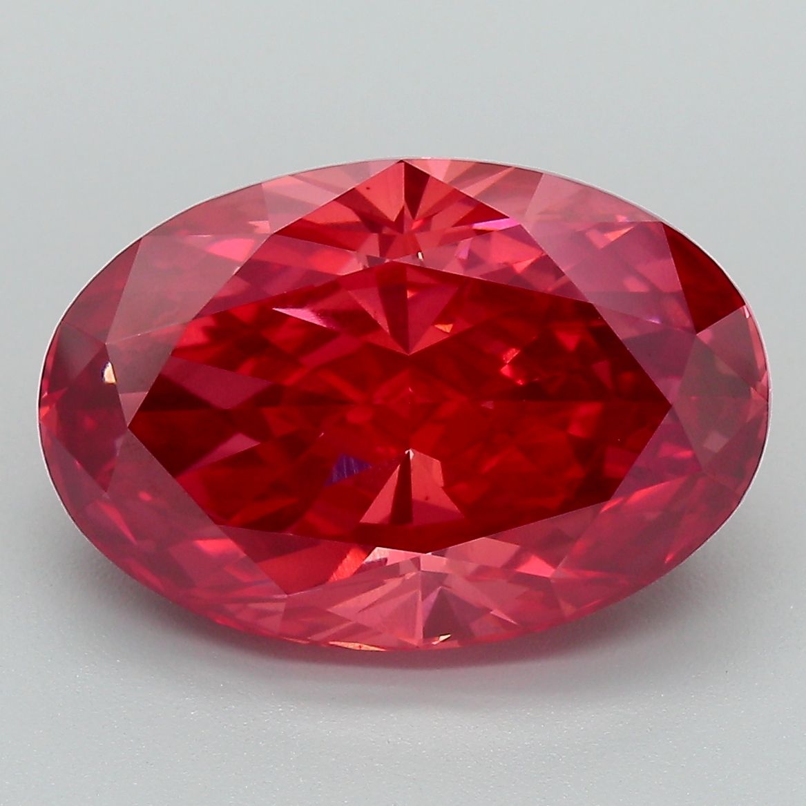 Lab-Grown Oval Diamond - 7.3 Carats, Fancy Vivid Pink Color, VS1 Clarity - Certified by IGI - Report Number: LG633488821