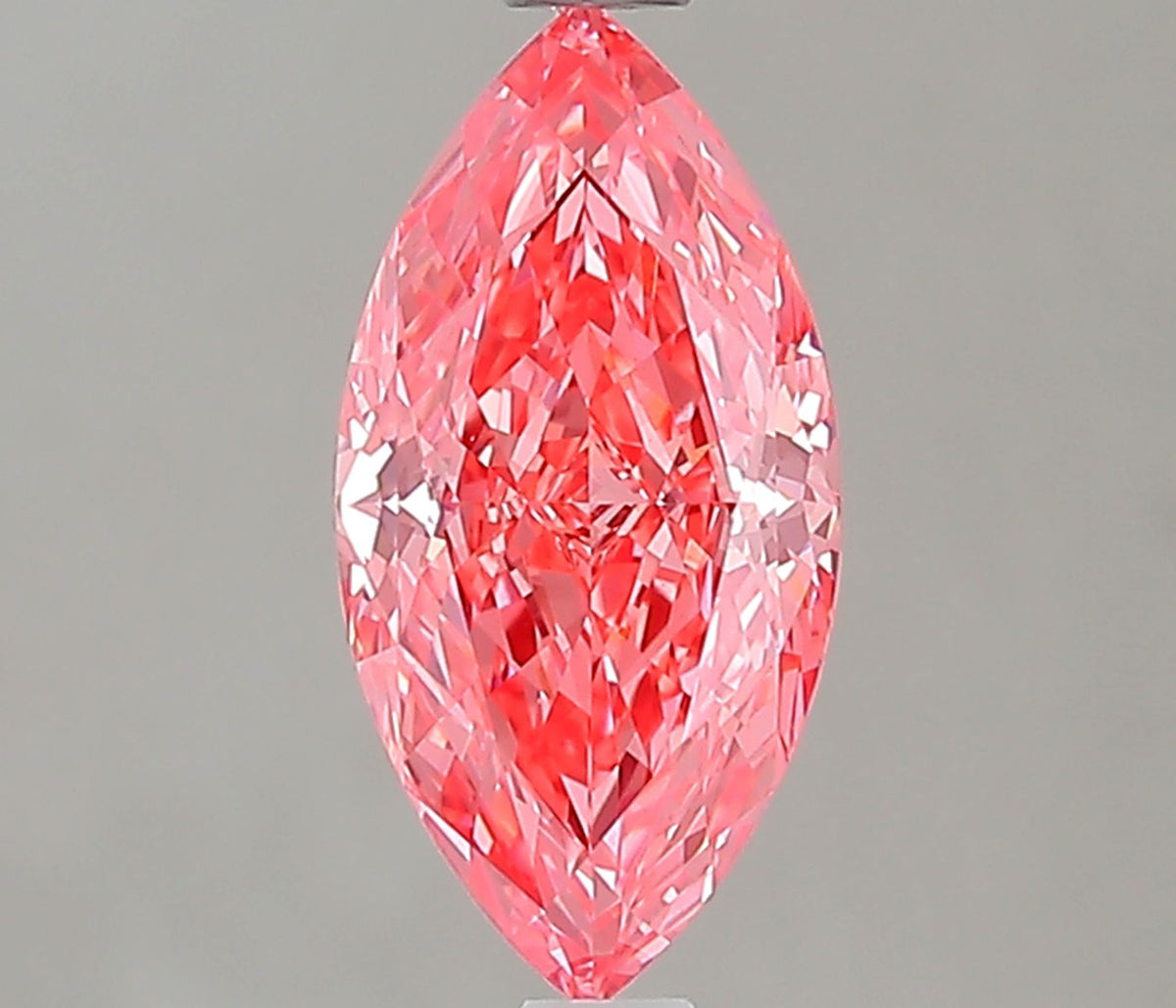 Lab-Grown Marquise Diamond - 1.11 Carats, Fancy Vivid Pink Color, VVS2 Clarity - Certified by IGI - Report Number: LG563238201