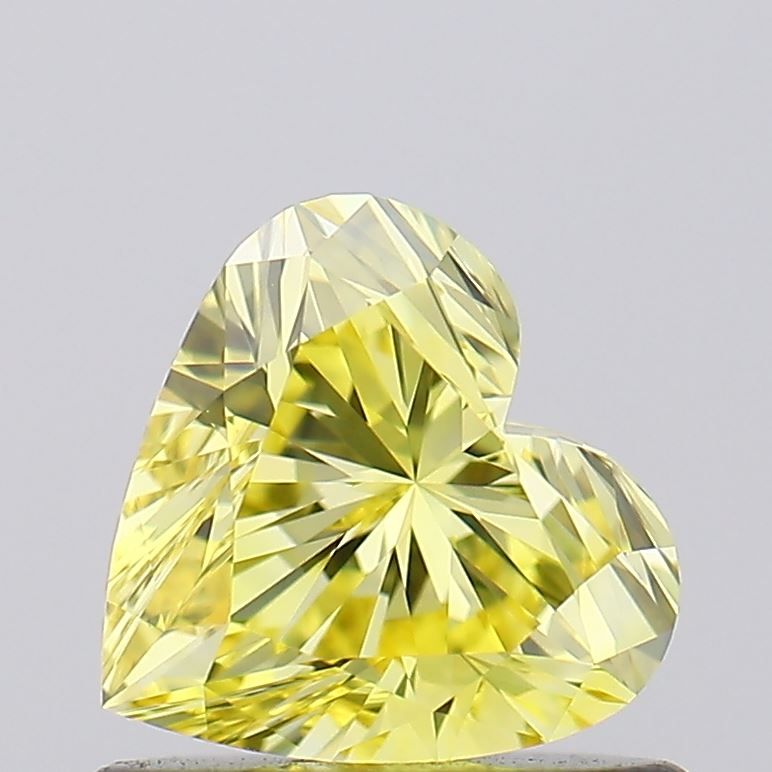 Lab-Grown Heart Diamond - 0.64 Carats, Fancy Vivid Yellow Color, VVS2 Clarity - Certified by IGI - Report Number: LG620448548