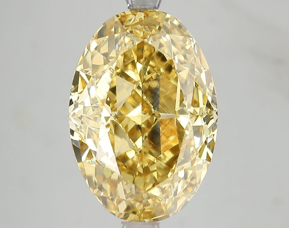 Lab-Grown Oval Diamond - 7.25 Carats, Fancy Vivid Yellow Color, VS1 Clarity - Certified by IGI - Report Number: LG671499089