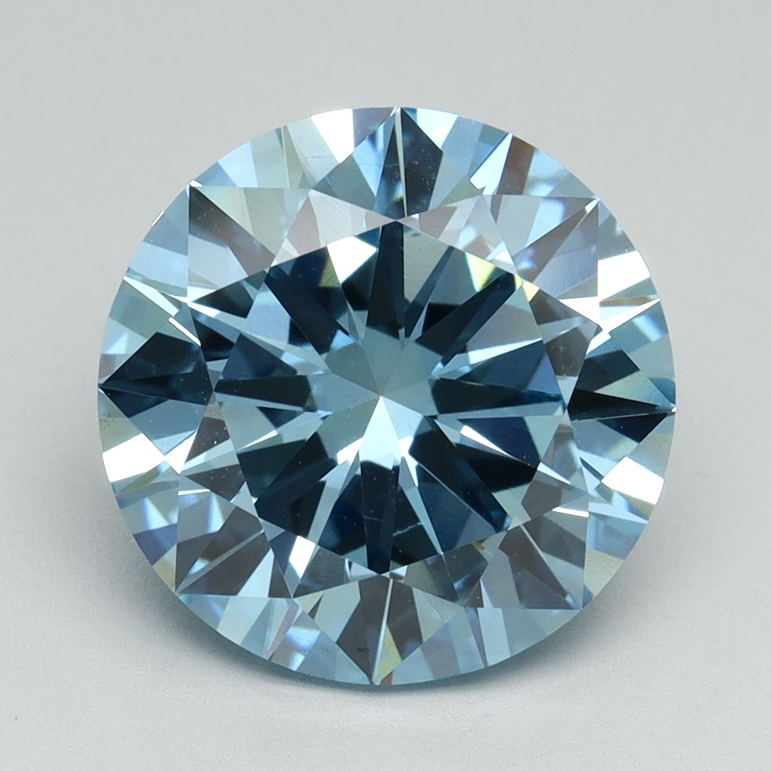 Lab-Grown Round Diamond - 5.04 Carats, Fancy Vivid Blue Color, VS2 Clarity - Certified by IGI - Report Number: LG645458822