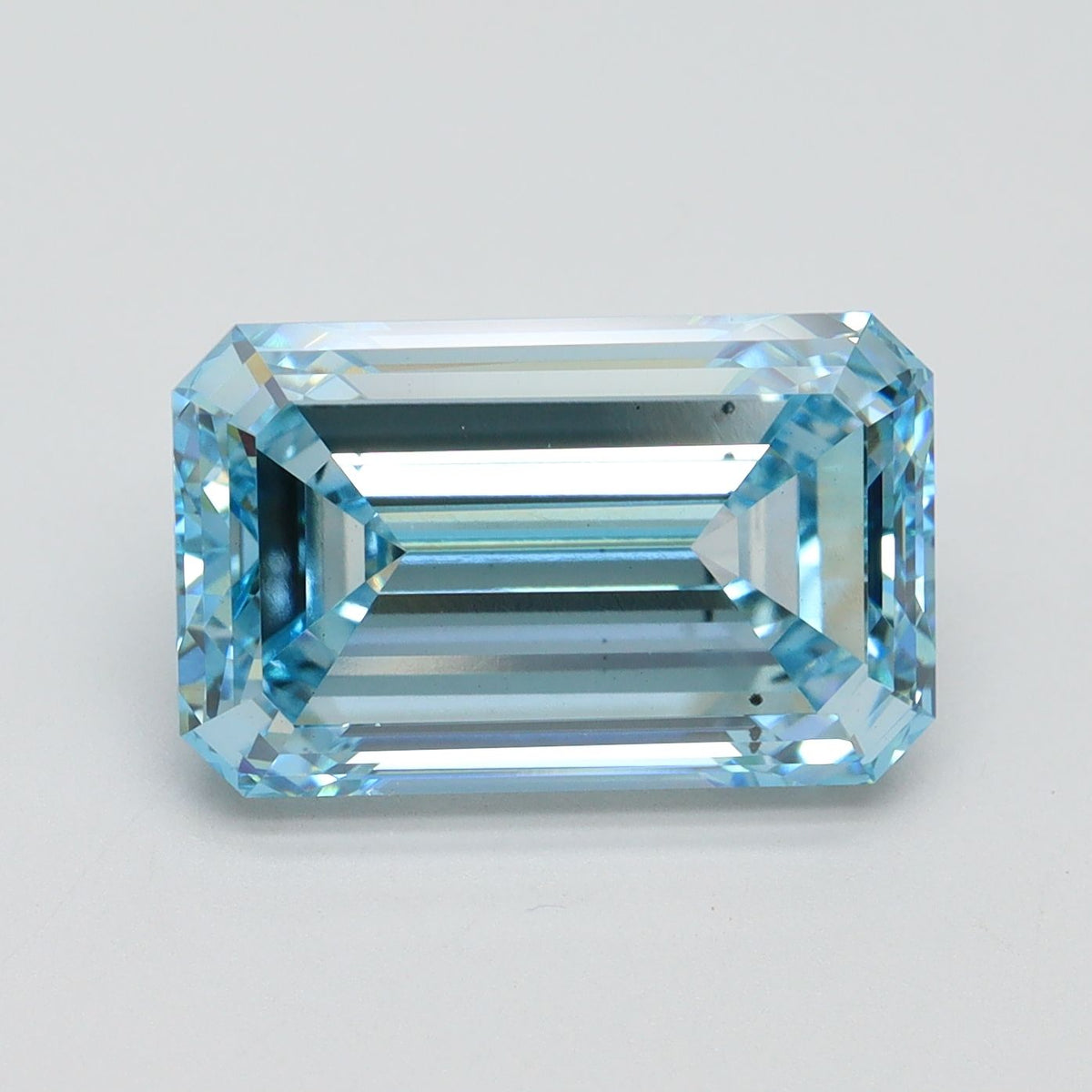 Lab-Grown Emerald Diamond - 6.02 Carats, Fancy Intense Blue Color, VS2 Clarity - Certified by IGI - Report Number: LG607348717