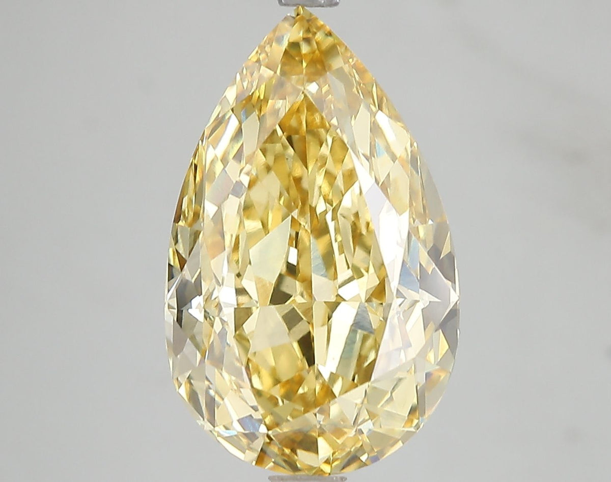 Lab-Grown Pear Diamond - 7.18 Carats, Fancy Vivid Yellow Color, VS1 Clarity - Certified by IGI - Report Number: LG671478726