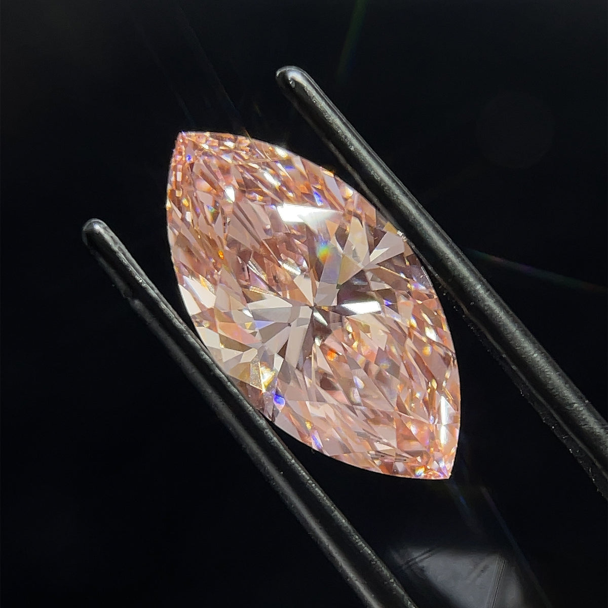 Lab-Grown Marquise Diamond - 4.55 Carats, Fancy Vivid Pink Color, VS1 Clarity - Certified by IGI - Report Number: LG635490400