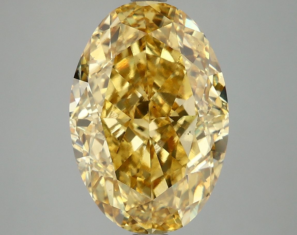 Lab-Grown Oval Diamond - 6.02 Carats, Fancy Vivid Yellow Color, VS2 Clarity - Certified by IGI - Report Number: LG671440724