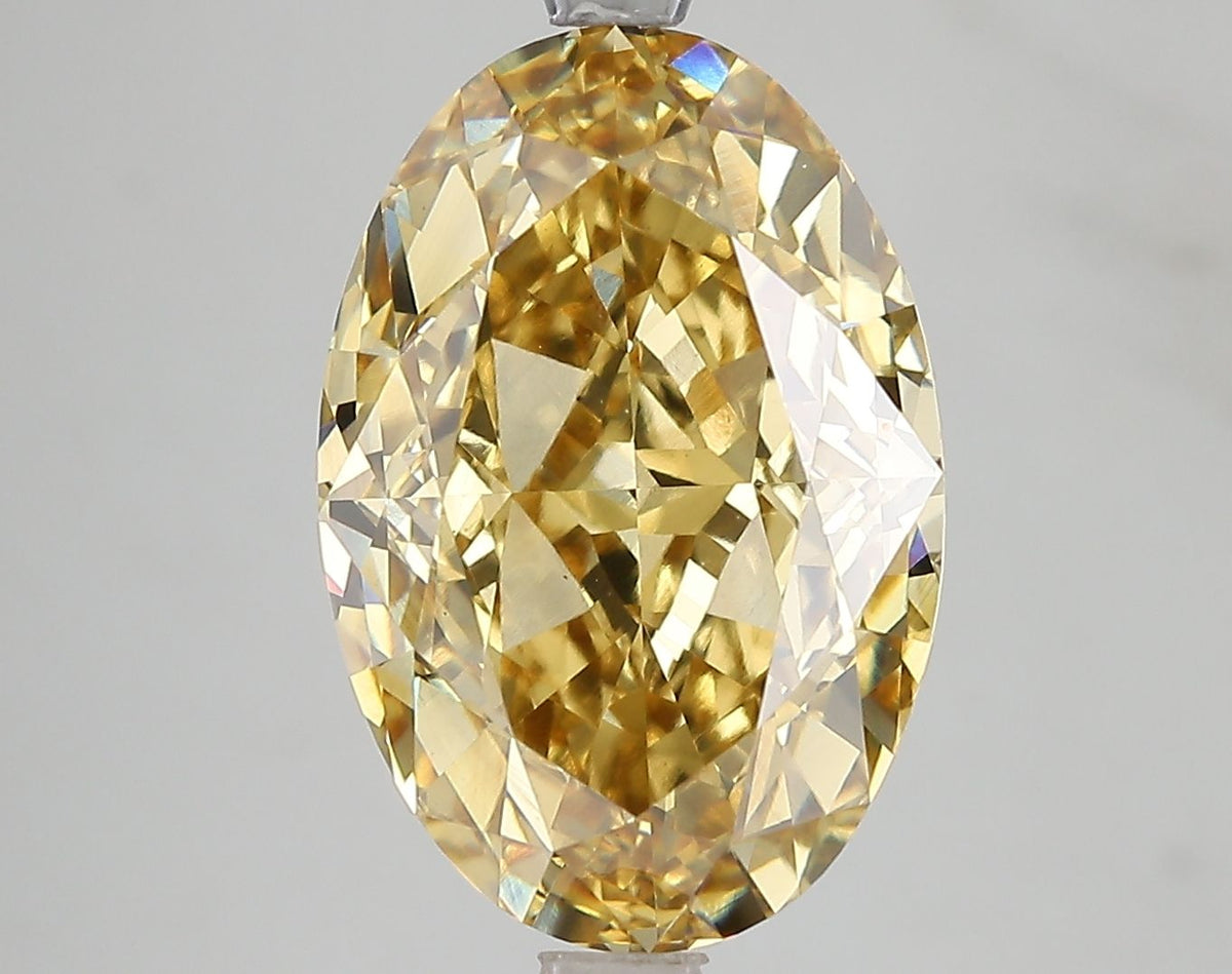Lab-Grown Oval Diamond - 7.14 Carats, Fancy Intense Yellow Color, VS1 Clarity - Certified by IGI - Report Number: LG671478724
