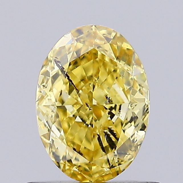 Lab-Grown Oval Diamond - 0.71 Carats, Fancy Vivid Yellow Color, SI2 Clarity - Certified by IGI - Report Number: LG636496667