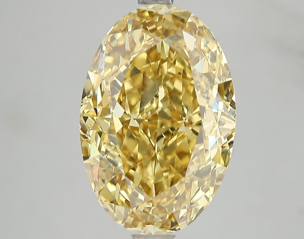 Lab-Grown Oval Diamond - 6.15 Carats, Fancy Vivid Yellow Color, VVS2 Clarity - Certified by IGI - Report Number: LG671499088
