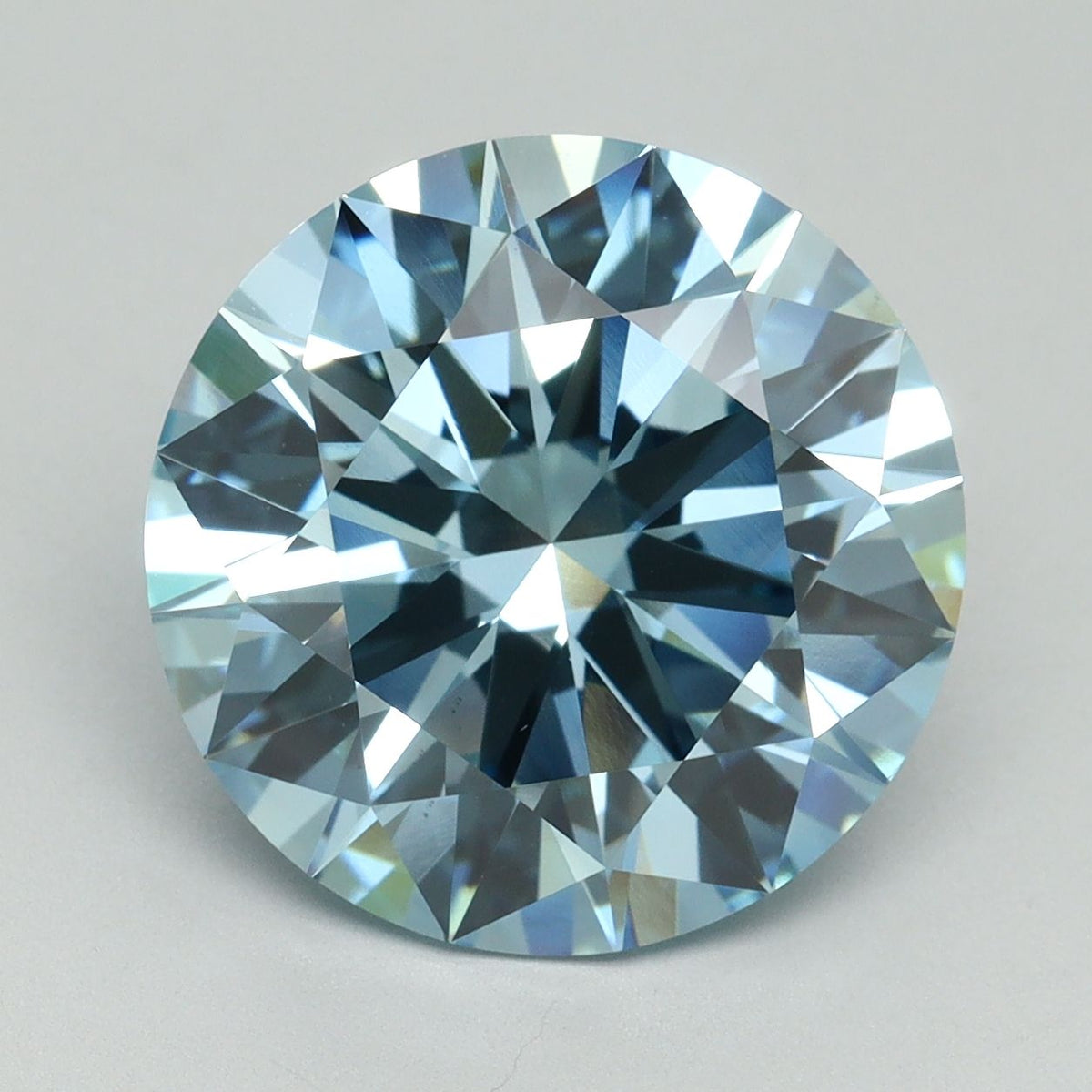 Lab-Grown Round Diamond - 7.02 Carats, Fancy Vivid Blue Color, VS1 Clarity - Certified by IGI - Report Number: LG636438443