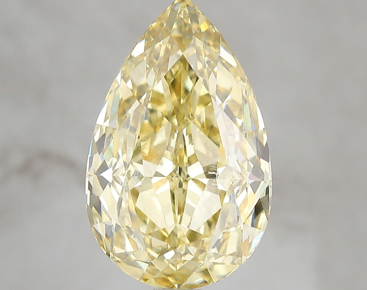 Lab-Grown Pear Diamond - 7.09 Carats, Fancy Vivid Yellow Color, VS1 Clarity - Certified by IGI - Report Number: LG671478722