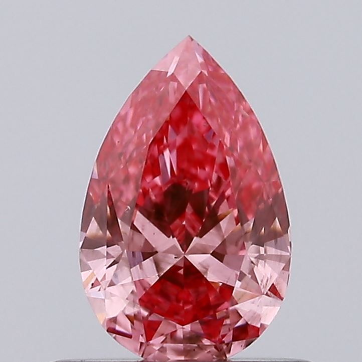 Lab-Grown Pear Diamond - 0.63 Carats, Fancy Vivid Pink Color, VS2 Clarity - Certified by IGI - Report Number: LG636476009