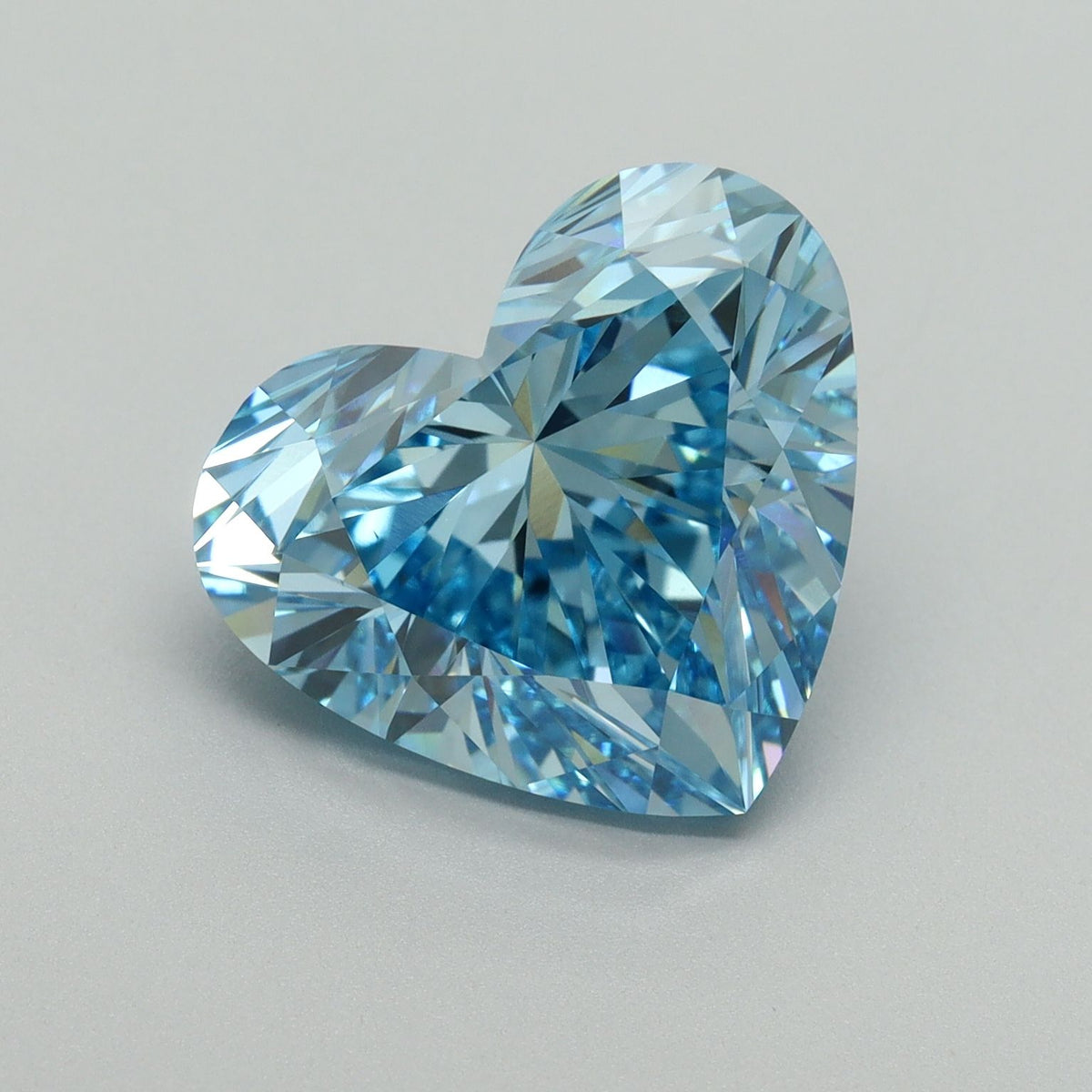 Lab-Grown Heart Diamond - 6.95 Carats, Fancy Vivid Blue Color, VS1 Clarity - Certified by IGI - Report Number: LG648463121