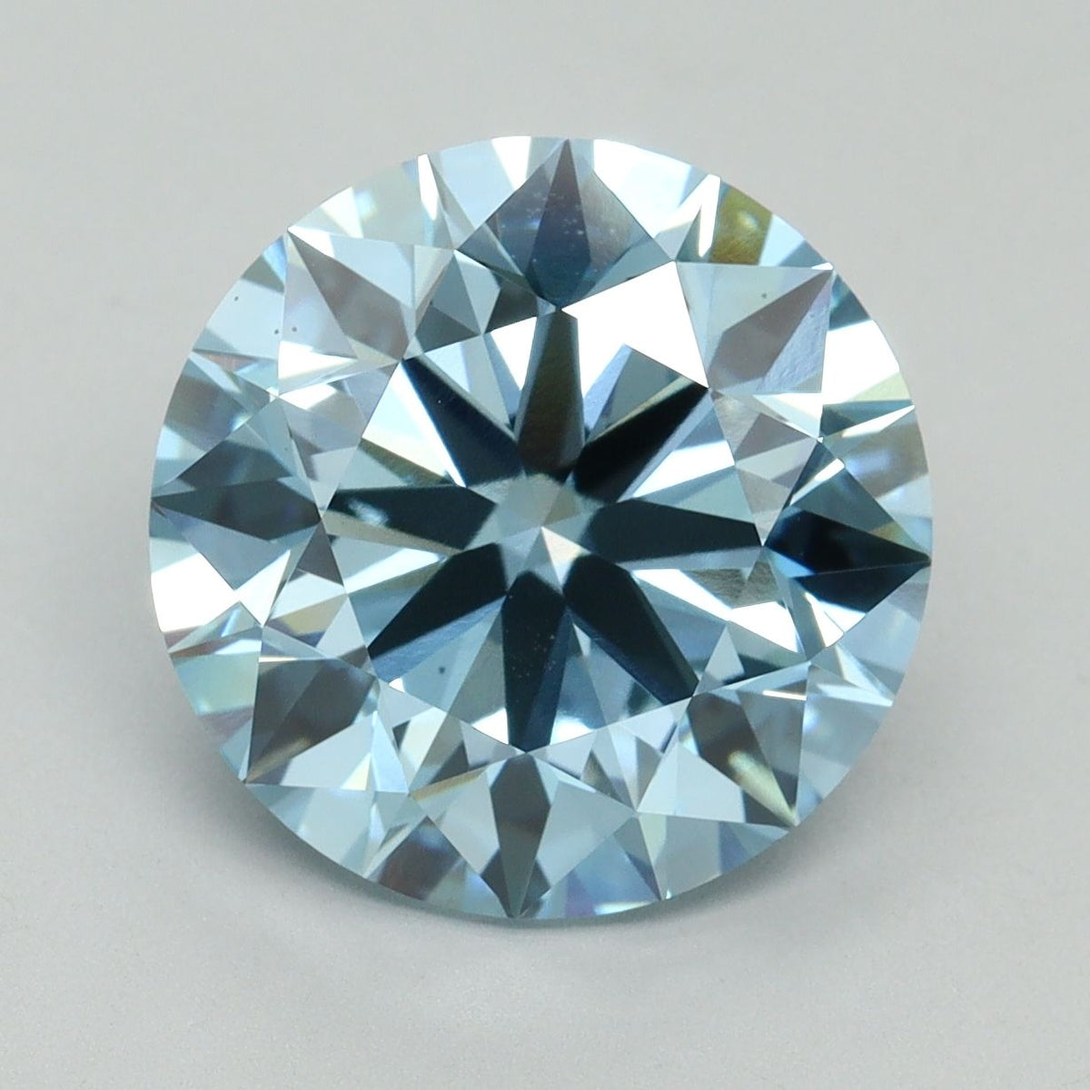 Lab-Grown Round Diamond - 6.12 Carats, Fancy Vivid Blue Color, VS1 Clarity - Certified by IGI - Report Number: LG636438445