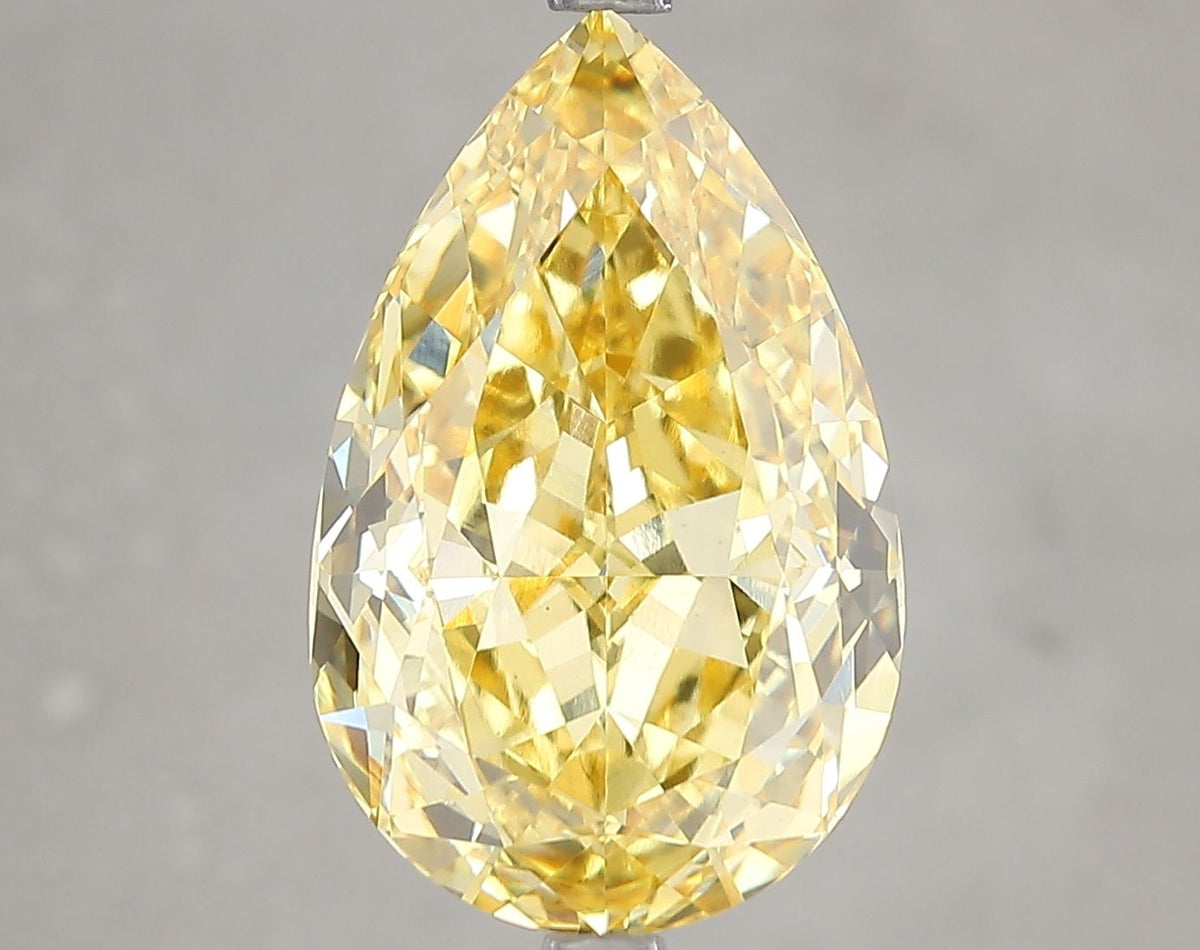 Lab-Grown Pear Diamond - 7.06 Carats, Fancy Vivid Yellow Color, VS1 Clarity - Certified by IGI - Report Number: LG659437548