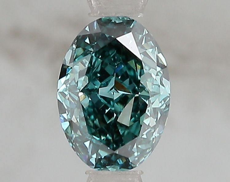 Lab-Grown Oval Diamond - 1.08 Carats, Fancy Vivid Green Color, VS1 Clarity - Certified by IGI - Report Number: LG671493160