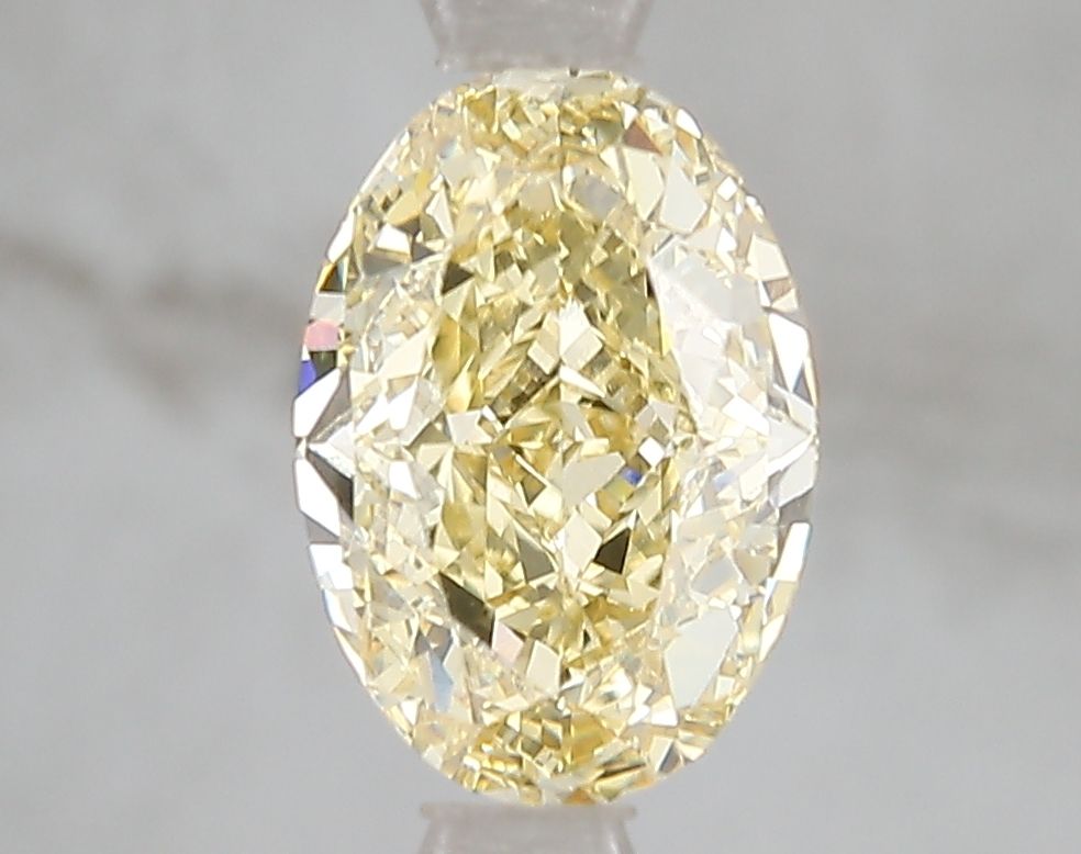 Lab-Grown Radiant Diamond - 1.03 Carats, Fancy Intense Yellow Color, VVS2 Clarity - Certified by IGI - Report Number: LG671494861