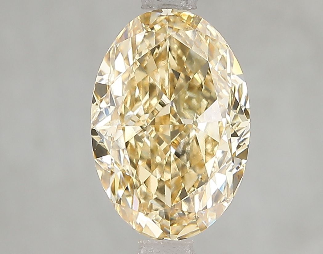 Lab-Grown Oval Diamond - 3.01 Carats, Fancy Yellow Color, VVS2 Clarity - Certified by IGI - Report Number: LG666432314
